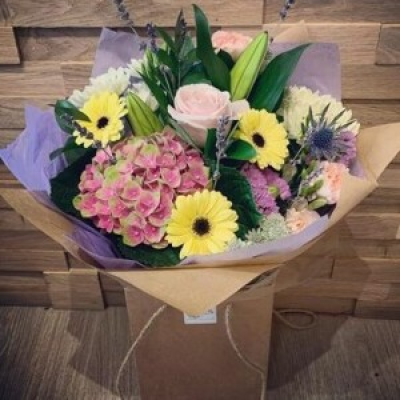 Summer Bouquet - Pink hydrangeas, lemon germinis, thistles and other complimentary flowers to create thus gorgeous bouquet