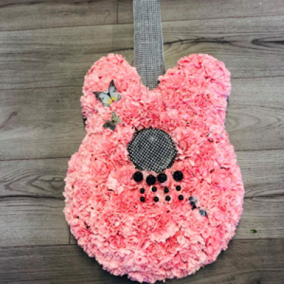 Guitar  - Made from pink carnations and designed to suit all ages 