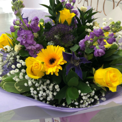 Spring bouquet - Beautiful yellow roses and purple flowers to create a truly gorgeous bouquet