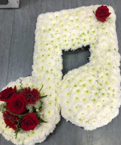 Musical note  - Based with white chrysanthemums and added red roses in this musical note