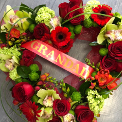 Open heart - Beautiful roses, hydrangeas, viburnum and many more complimentary flowers to make this a beautiful tribute for a funeral